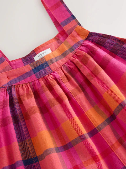 Combinaison large enfant à carreaux rose et orange (3-16 ans)