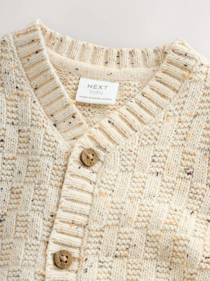 Gilet bébé en maille torsadée Milk club écru