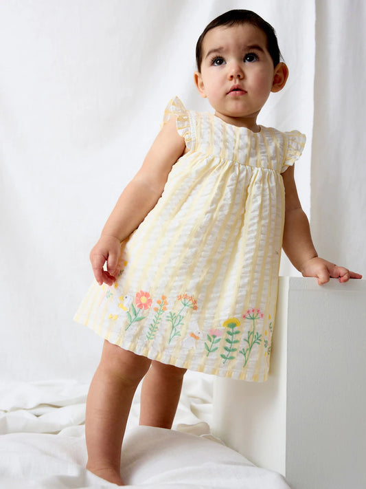 Robe bébé écrue à broderies florales