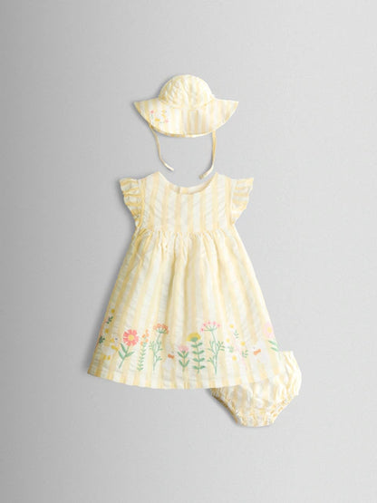 Robe bébé écrue à broderies florales