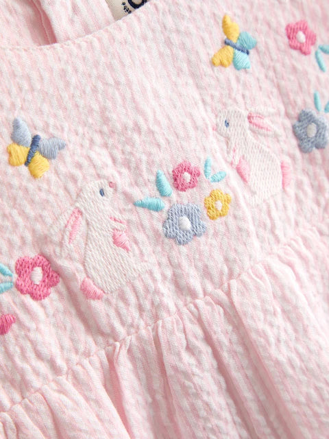 Ensemble bébé robe rose, culotte et chapeau assortis