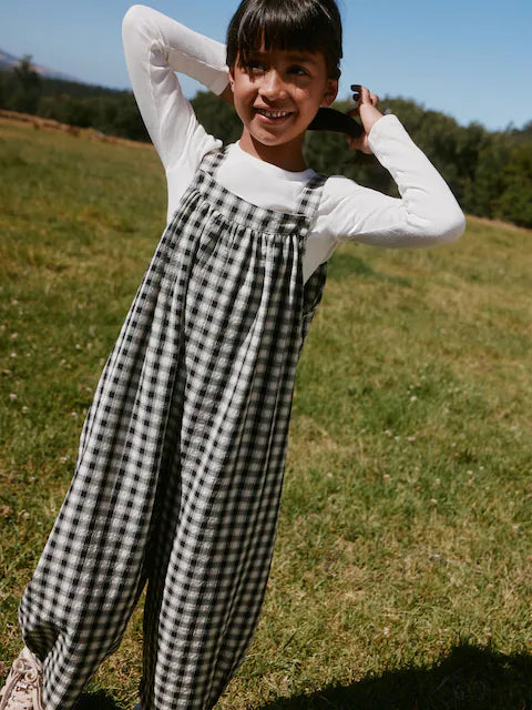 Combinaison enfant à carreaux noir et blanc style ample (3-16 ans)