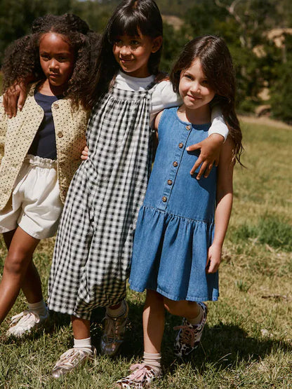 Combinaison enfant à carreaux noir et blanc style ample (3-16 ans)