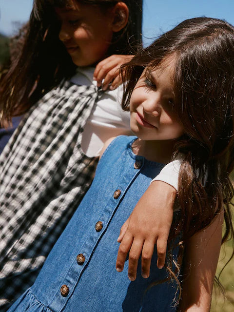 Combinaison enfant à carreaux noir et blanc style ample (3-16 ans)