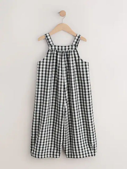 Combinaison enfant à carreaux noir et blanc style ample (3-16 ans)