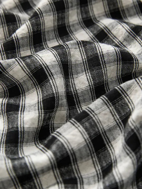 Combinaison enfant à carreaux noir et blanc style ample (3-16 ans)