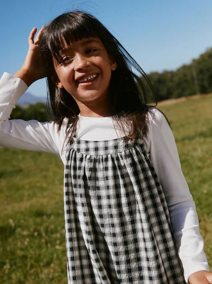 Combinaison enfant à carreaux noir et blanc style ample (3-16 ans)
