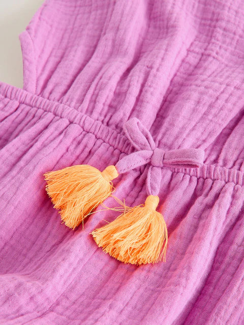 Combinaison enfant violette avec pompons décoratifs (3-16 ans)