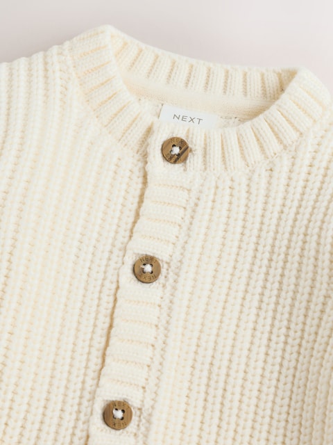 Veste bébé en maille côtelée – Gilet boutonné motif soleil