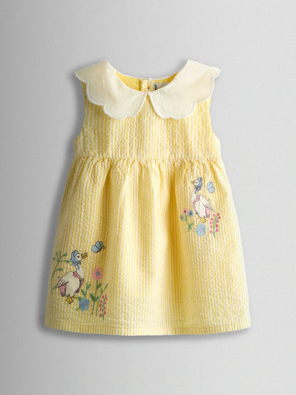 Robe bébé jaune pastel à col Claudine