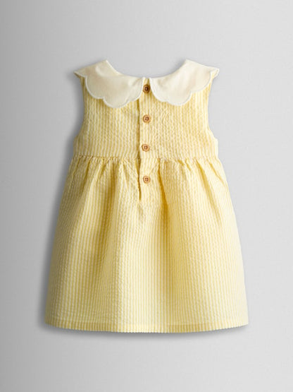 Robe bébé jaune pastel à col Claudine