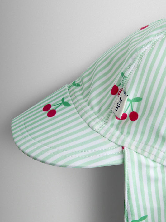 Casquette anti-UV à rayures et cerises pour bébé
