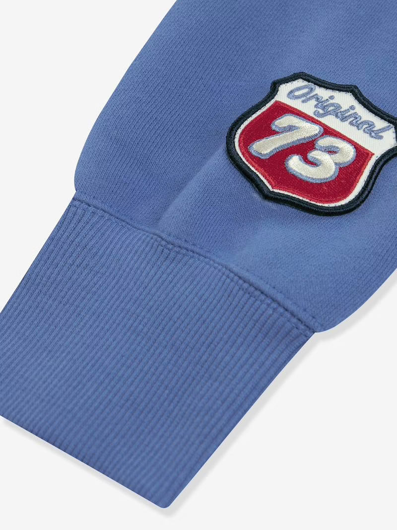 Capuche Levi's couleur bleu réalisé en tissu peluche de haute qualité
